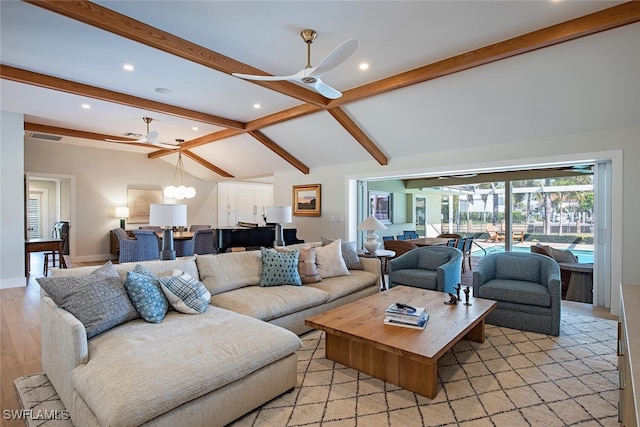 living room with vaulted ceiling with beams, ceiling fan with notable chandelier, and light hardwood / wood-style floors