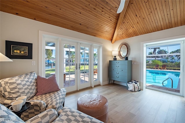 entryway with french doors, vaulted ceiling with beams, wood ceiling, light hardwood / wood-style flooring, and ceiling fan