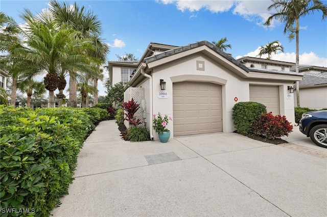 view of front of property with a garage