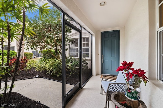 sunroom / solarium featuring plenty of natural light