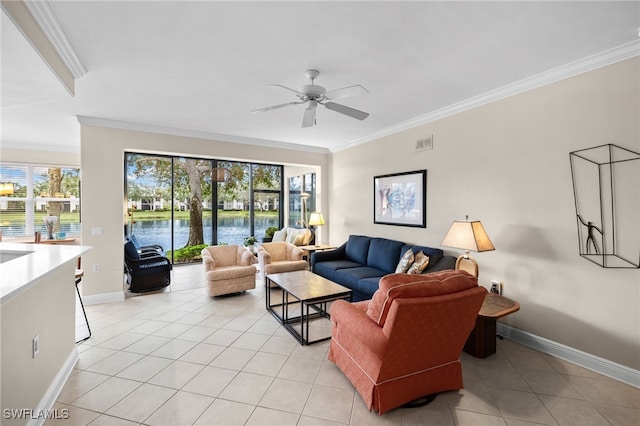 tiled living room featuring a water view, ceiling fan, plenty of natural light, and crown molding