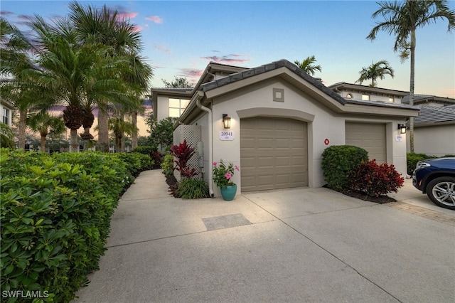 view of front of property featuring a garage