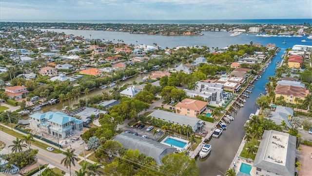 drone / aerial view with a water view