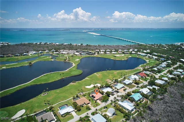 bird's eye view with a water view