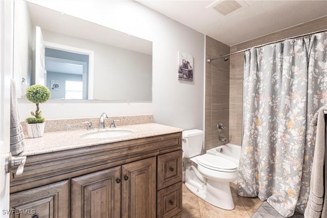 full bathroom featuring shower / bathtub combination with curtain, vanity, tile patterned flooring, and toilet