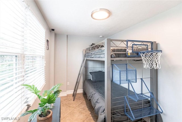 bedroom featuring tile patterned floors