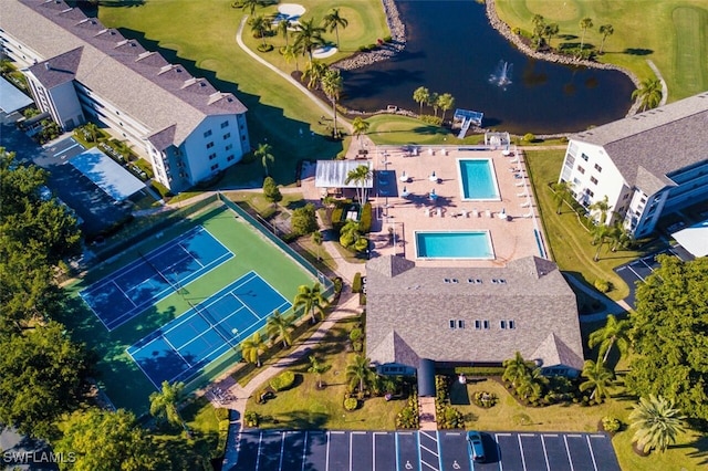 bird's eye view with a water view