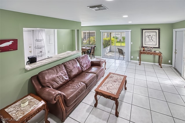 living room with light tile patterned floors