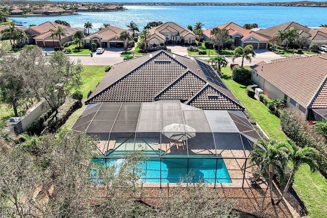 bird's eye view with a water view