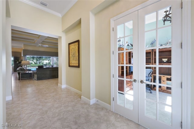 doorway featuring coffered ceiling, crown molding, french doors, and beamed ceiling