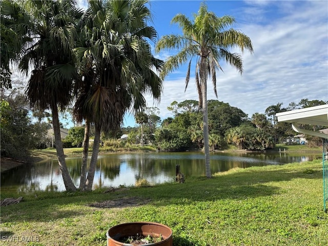 water view featuring an outdoor fire pit