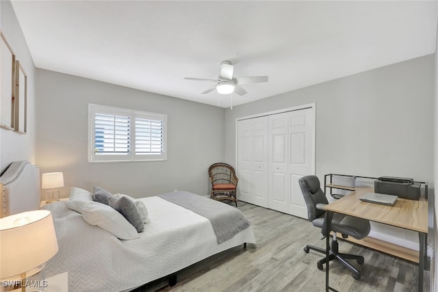 738 101st Ave N, Naples, FL 34108 - bedroom featuring a closet, wood finished floors, a desk, and a ceiling fan