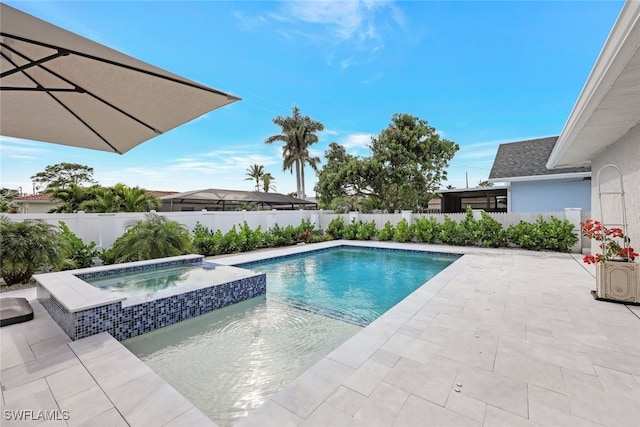 738 101st Ave N, Naples, FL 34108 - view of pool featuring a patio area, a fenced backyard, and a pool with connected hot tub