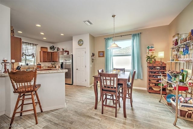 dining area featuring a wealth of natural light