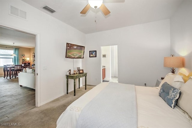 carpeted bedroom with ceiling fan