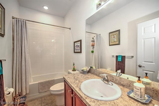 full bathroom featuring toilet, shower / bath combo, vanity, and tile patterned floors