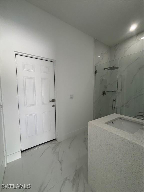 3204 20th St SW, Lehigh Acres, FL 33976 - full bathroom featuring a marble finish shower, marble look tiles, and vanity
