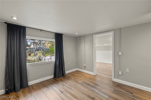 empty room featuring light hardwood / wood-style flooring