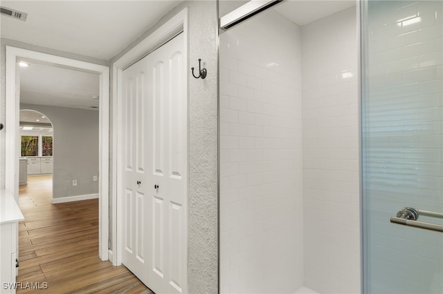 hallway featuring hardwood / wood-style floors