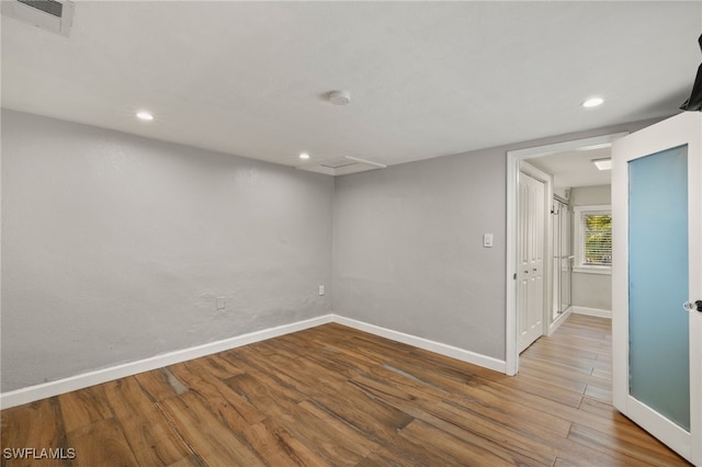 empty room featuring hardwood / wood-style floors