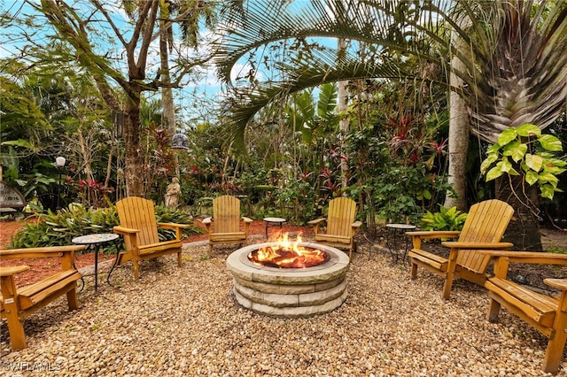 view of patio featuring an outdoor fire pit