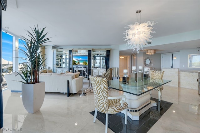 dining space featuring an inviting chandelier