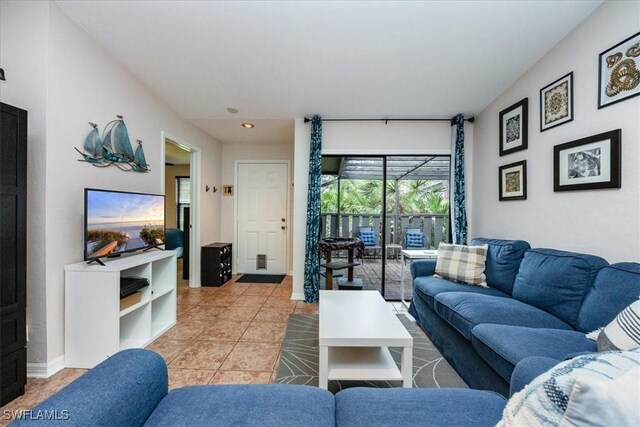 living room with tile patterned floors