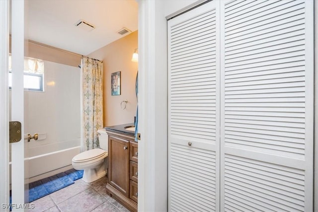 full bathroom with toilet, tile patterned flooring, shower / bathtub combination with curtain, and vanity