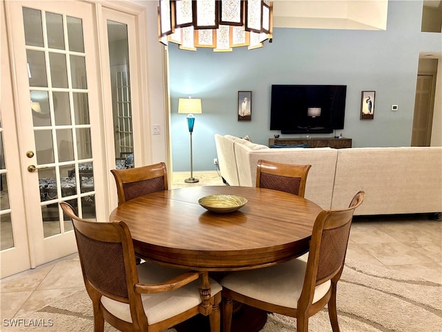 dining room featuring light tile patterned floors