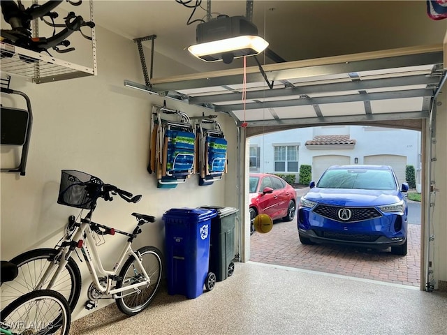 garage featuring a garage door opener