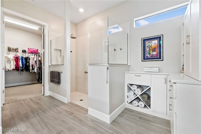 bathroom featuring walk in shower