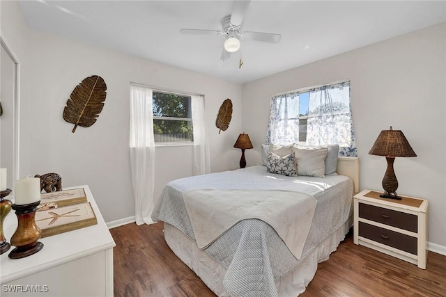 bedroom featuring dark wood-type flooring and ceiling fan