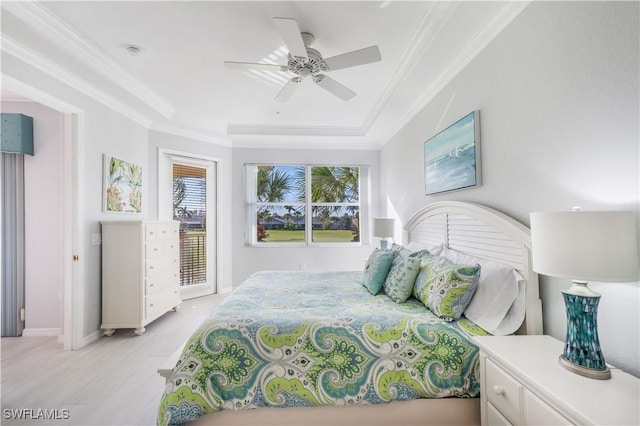 bedroom featuring crown molding, ceiling fan, light hardwood / wood-style flooring, and access to outside