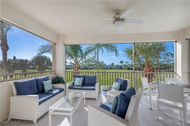 view of patio with outdoor lounge area and ceiling fan