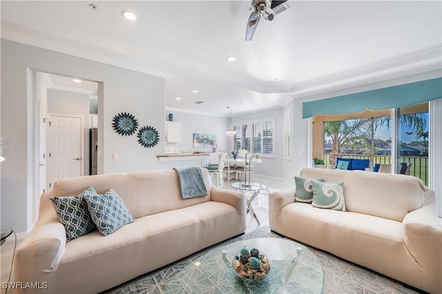 living room with ornamental molding