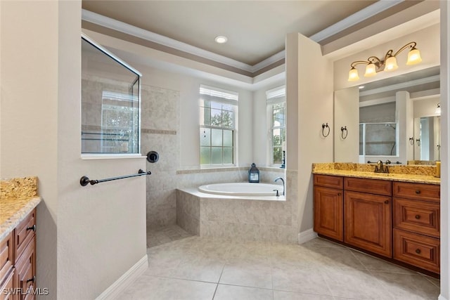 bathroom featuring tile patterned floors, vanity, crown molding, and shower with separate bathtub