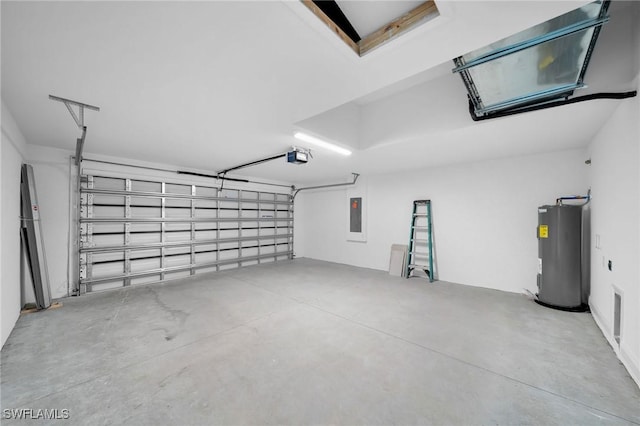 garage featuring a garage door opener, electric panel, and electric water heater