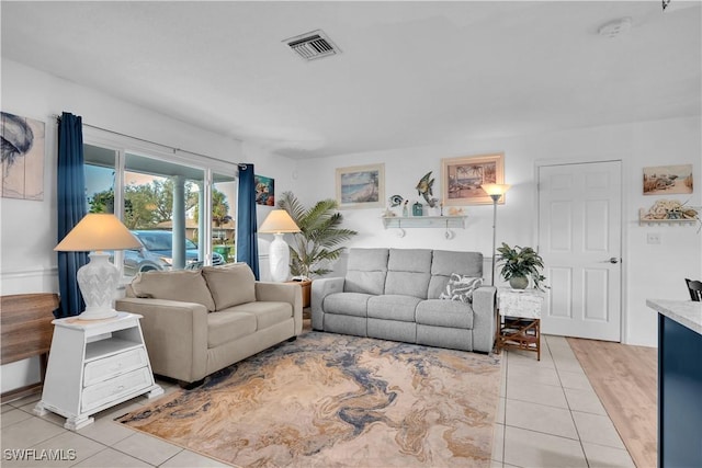 living room featuring light tile patterned flooring