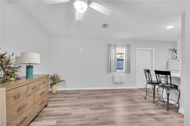 interior space featuring ceiling fan and light wood-type flooring