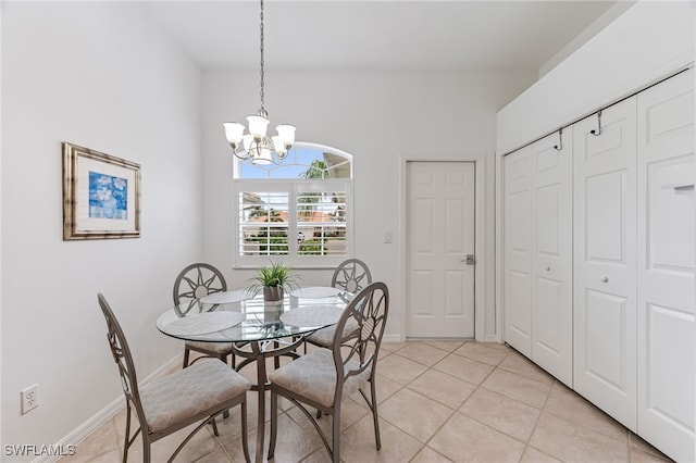 dining space featuring an inviting chandelier and light tile patterned floors