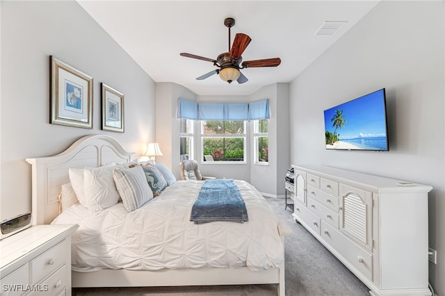 bedroom with ceiling fan and carpet flooring