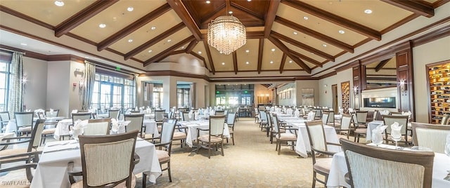 dining space featuring high vaulted ceiling, crown molding, and a chandelier