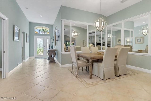 14113 Tivoli Ter, Bonita Springs, FL 34135 - dining area with a chandelier, light tile patterned floors, and recessed lighting