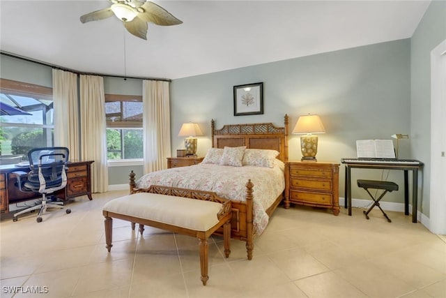 tiled bedroom with ceiling fan