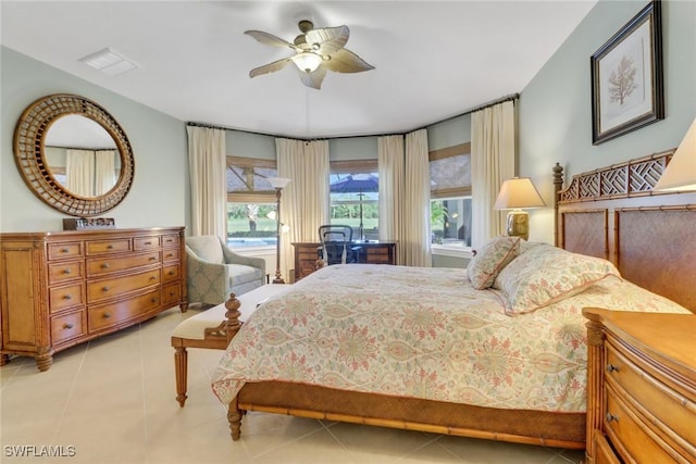 14113 Tivoli Ter, Bonita Springs, FL 34135 - bedroom featuring light tile patterned floors and ceiling fan