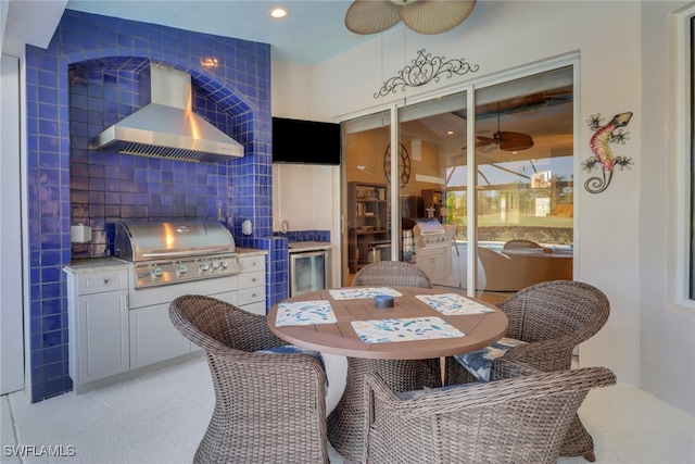 interior space featuring an outdoor kitchen and a grill