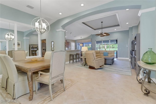 14113 Tivoli Ter, Bonita Springs, FL 34135 - dining space with a ceiling fan, arched walkways, a chandelier, recessed lighting, and light tile patterned floors