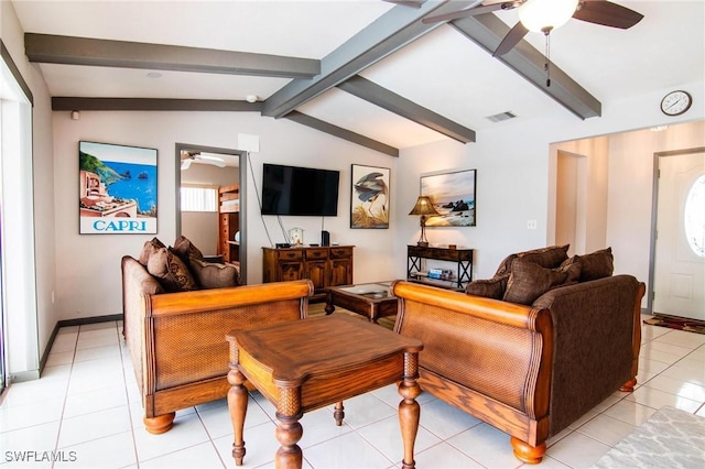 tiled living room featuring lofted ceiling with beams