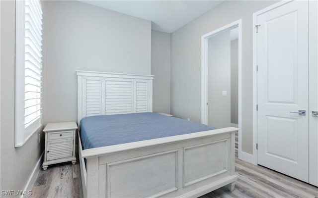 bedroom featuring light hardwood / wood-style floors