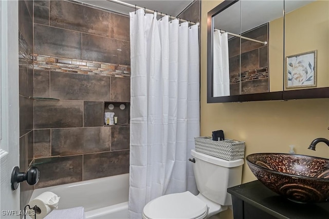 full bathroom featuring toilet, vanity, and shower / bath combo